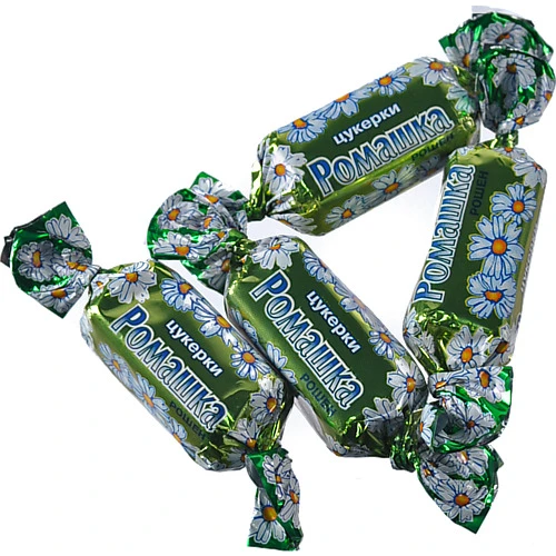 Цукерки глазуровані з помадним корпусом Ромашка Roshen кг