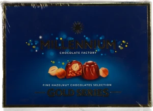 Цукерки шоколадні з горіховим праліне і цілим лісовим горіхом у молочному шоколаді Gold Millennium к/у 205г