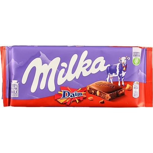Шоколад молочний зі шматочками хрумкої карамелі з мигдалем Milka м/у 100г