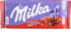 Шоколад молочний зі шматочками хрумкої карамелі з мигдалем Milka м/у 100г