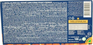 Шоколад молочний з цілими лісовими горіхами та родзинками Gold Millennium к/у 100г