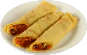 Млинці з курагою, родзинками та медом