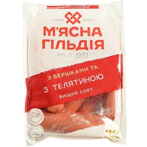 Сосиски «М’ясна Гільдія» з вершками та телятиною, вищого ґатунку, ТОВ "Житомирський м'ясокомбінат", вакуумна упаковка