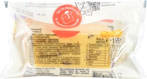 Сир твердий «КОМО Горіховий з волоським горіхом» 50% брусок 185 г